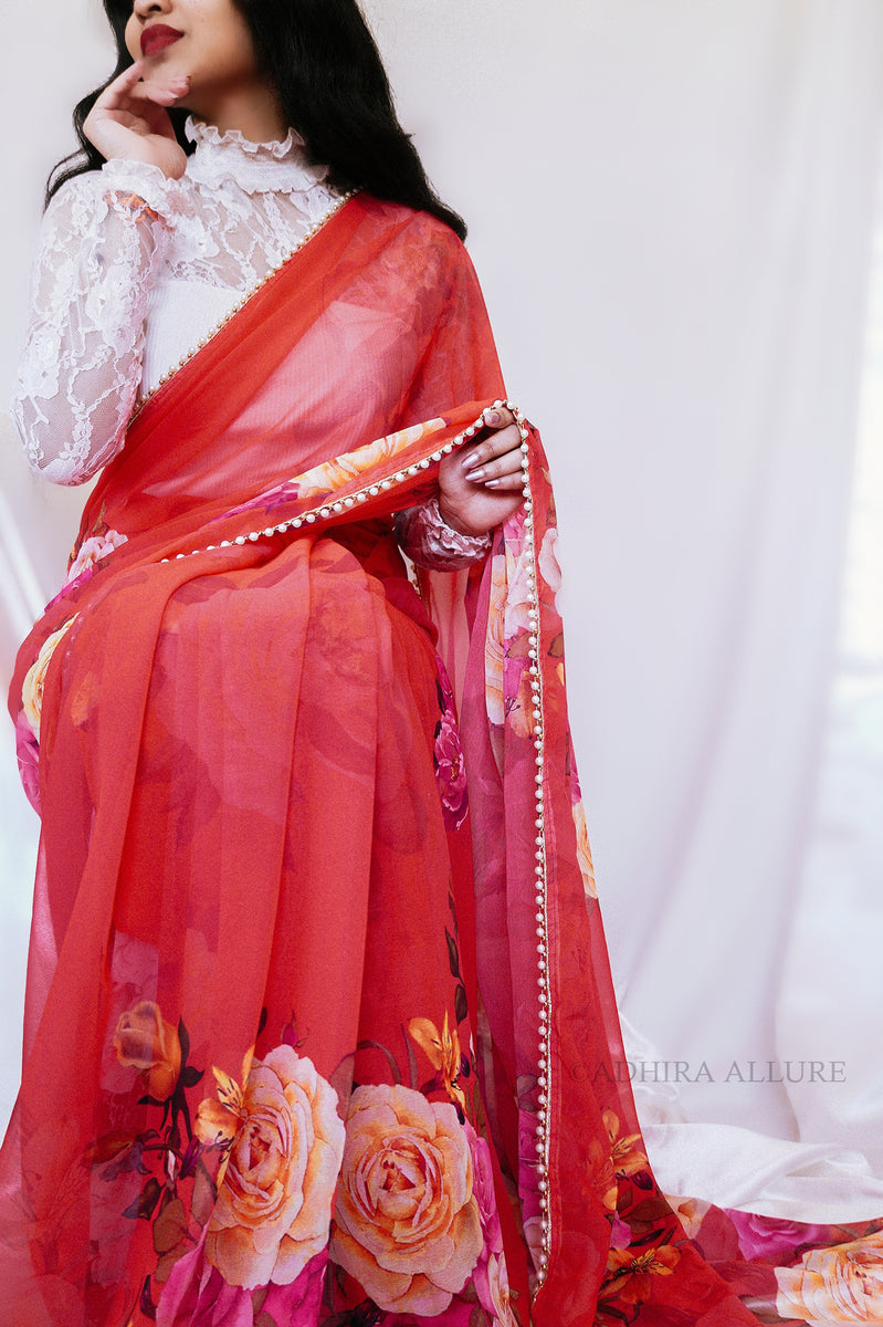 Red floral print saree with pearl border