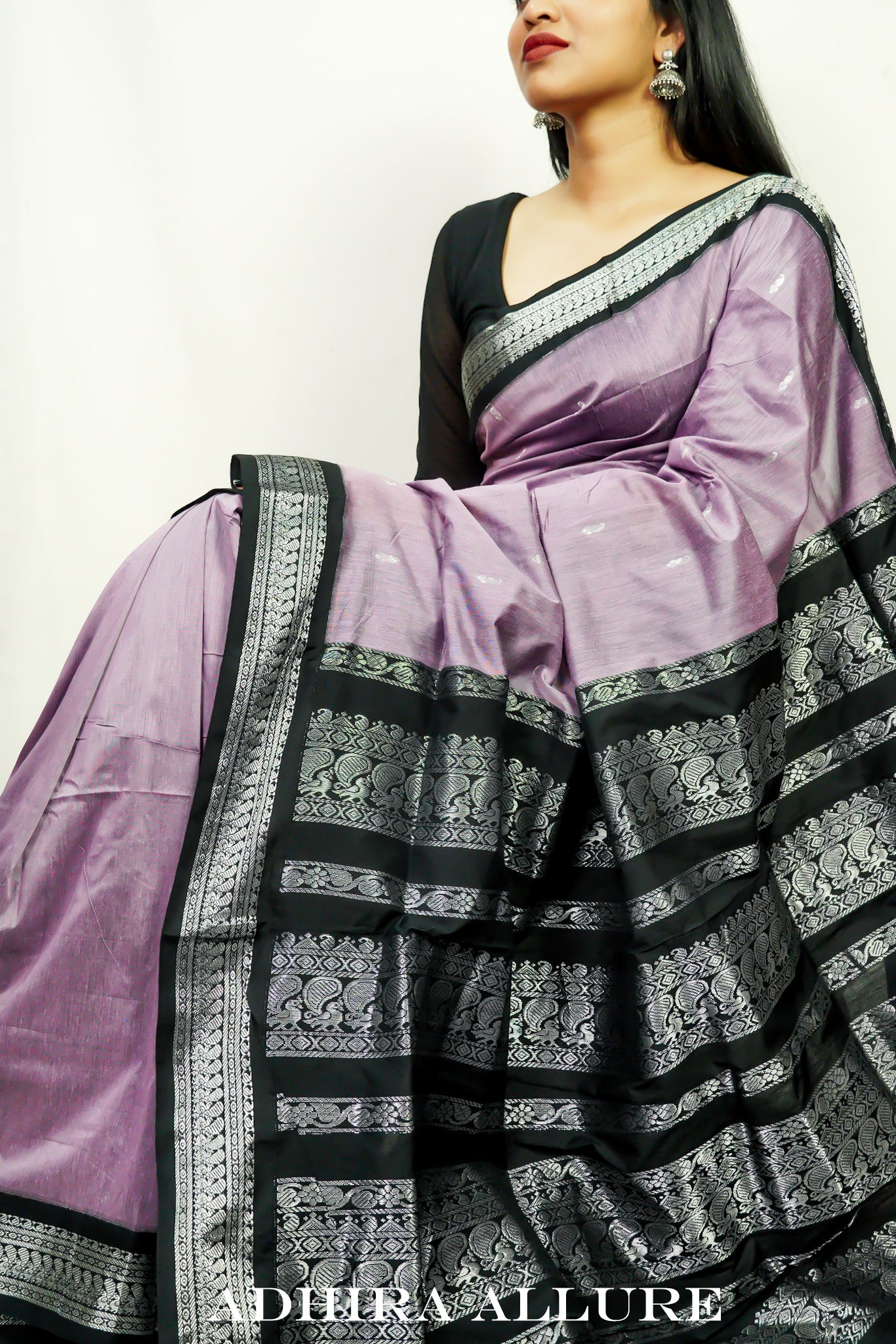 Draped in this soft kota silk lavender saree with silver zari woven border  from @akrutisarees_ak with Warli embroidery on the entire sar... | Instagram